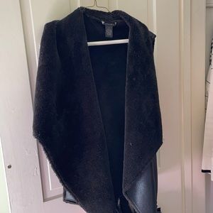 Black faux fur vest
